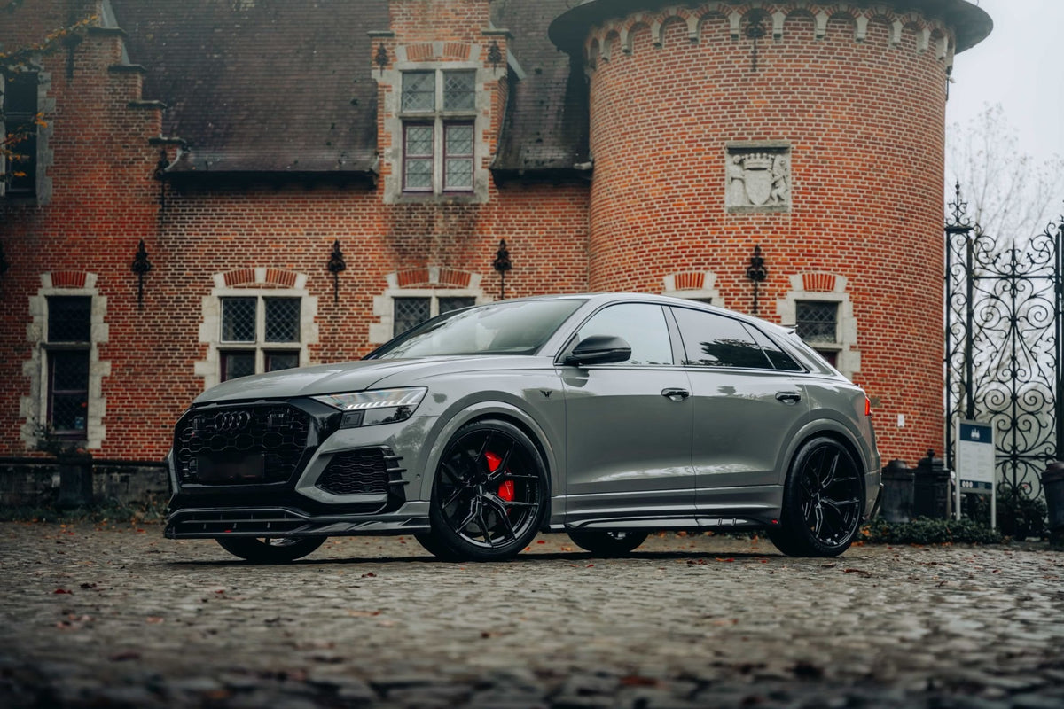 Grey Urban Audi RS Q8 in front of a castle