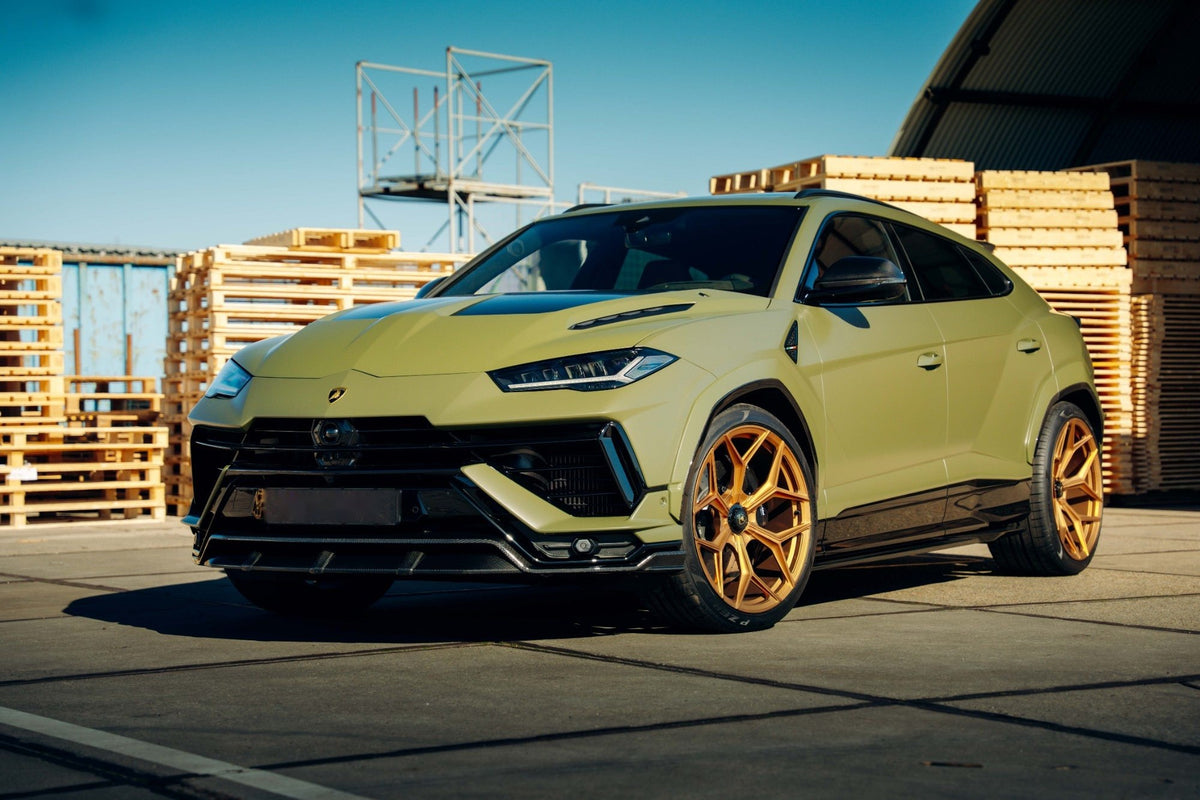 Matte green Urban Lamborghini Urus with gold wheels
