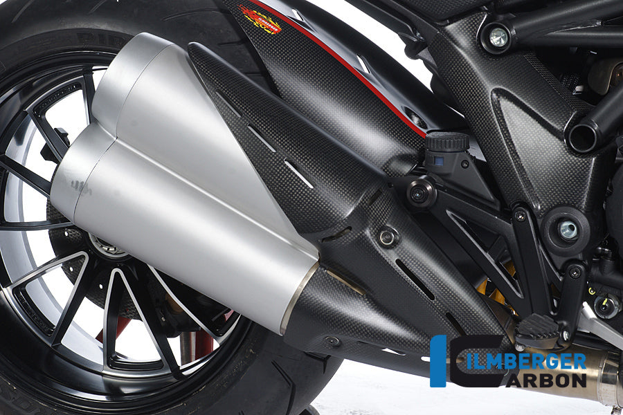 Exhaust heat shield on silencer carbon