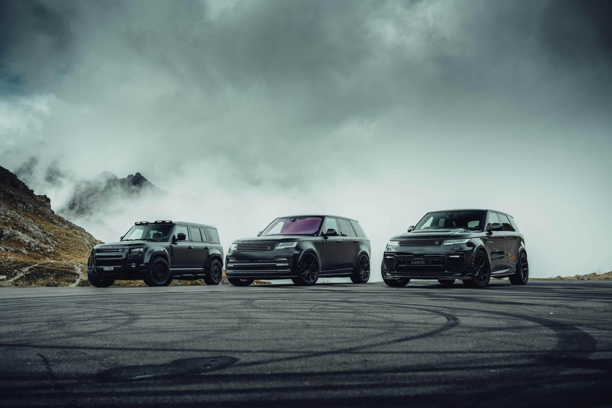 Urban Defender, Range Rover and Range Rover Sport in mountain fog